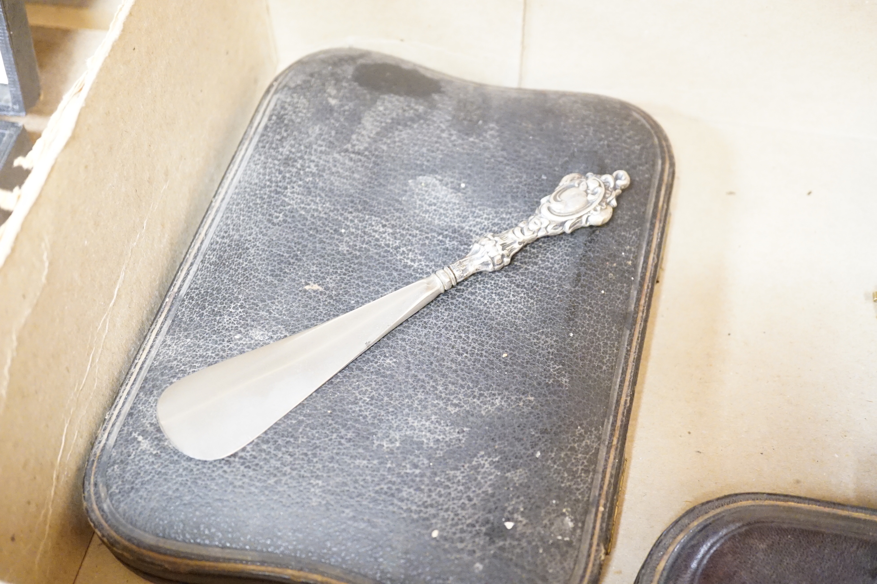 A group of assorted cased flatware comprising a set of six silver coffee spoons, Birmingham 1949, 100 grams, a silver fork and plated spoon christening set, fork 49 grams, a set of five Edwardian silver teaspoons and ton